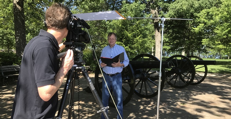 USA Writer-in-Residence Frye Gaillard, right, is filmed by Preston Sullivan in Chattanooga, Tenn., for the documentary "Journey to the Wilderness." Photo courtesy of Mike Letcher.