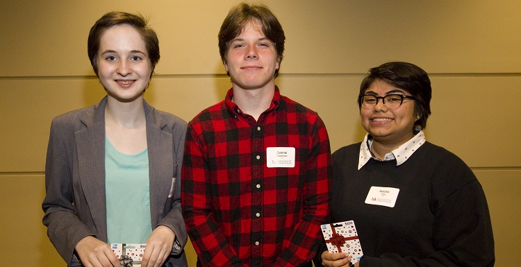 Natalia Trejo, right, received first place in the 2018 High School Public Speaking Contest. Gabriel Robertson, center, came in second, followed by Beata Casiday. 