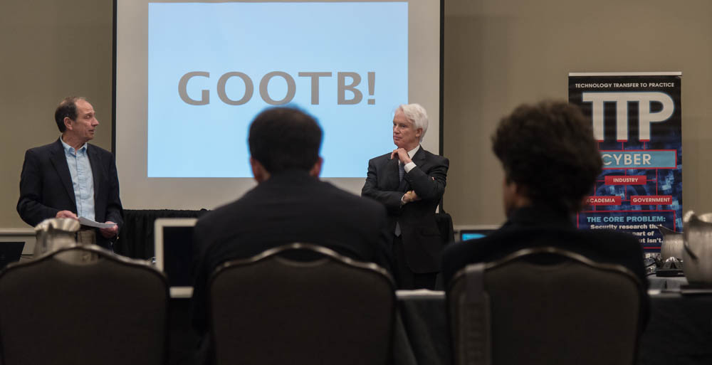 Dr. Alec Yasinsac, left, dean of South’s School of Computing, and Michael Chambers, USA assistant vice president for research innovation, lead a spring workshop in Birmingham as part of South's grant to advance research to real-world applications. 