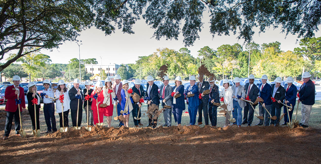 South alumni and supporters break ground Friday on the Julian and Kim MacQueen Alumni Center, which will serve as the permanent home for South’s more than 80,000 alumni. The center is projected to be completed by Spring 2020. data-lightbox='featured'