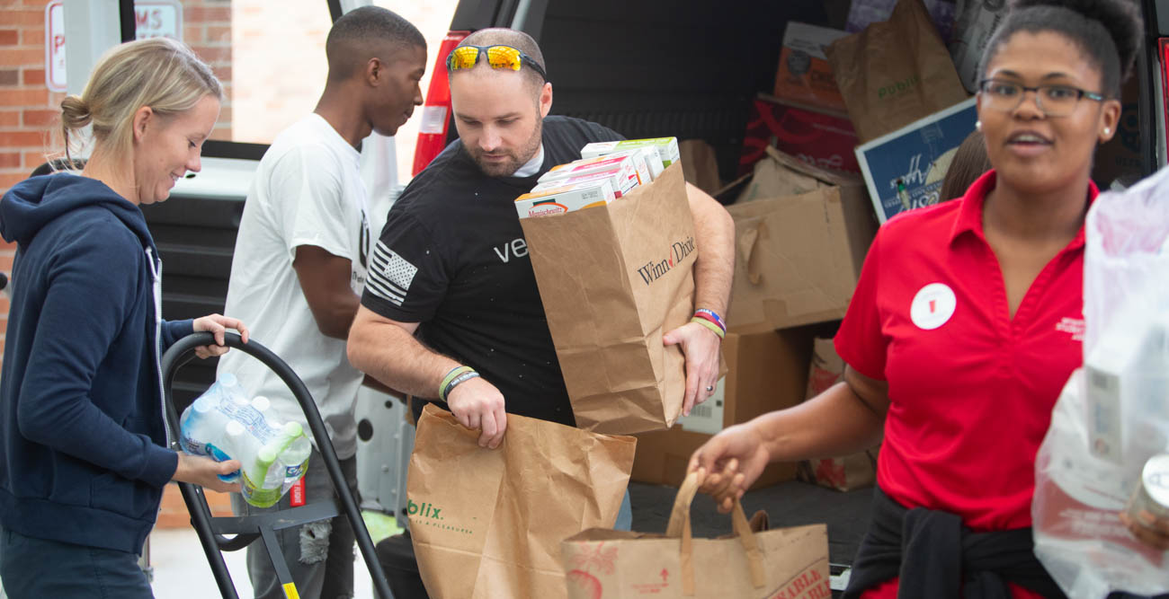 Student volunteers unload the largest donation ever for the Donor to Diner food pantry at South. The donations came from Ahavas Chesed Synagogue. 
