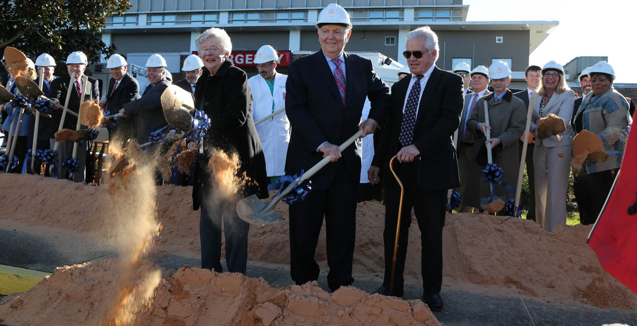 Gov. Kay Ivey and Bert Meisler, center, broke ground Tuesday on the Fanny Meisler Trauma Center at University Hospital.