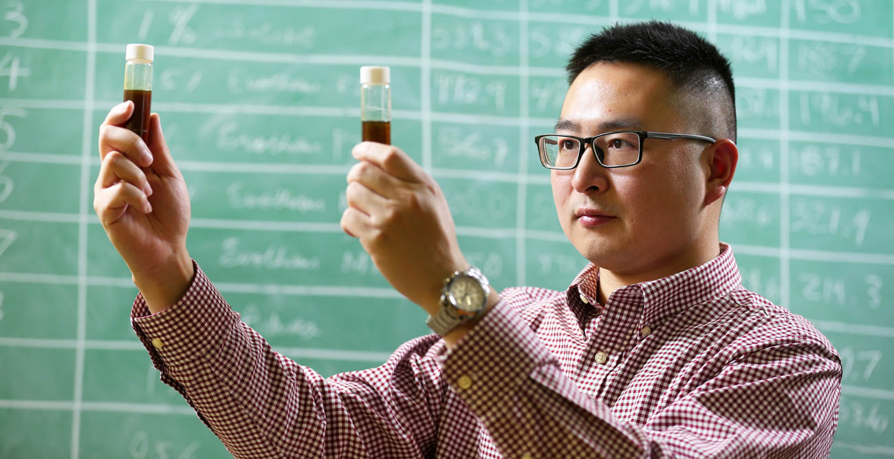 Omar Tahri, left, a civil engineering junior from Morocco, works side by side with Assistant Professor Dr. Shenghua Wu in the asphalt lab. “It’s really nice to be hands on with materials that you are making predictions about and see your ideas become reality,” Tahri said. 