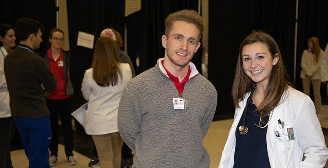 David Green, a physical therapy student, and Callie Braggs, a physician assistant student, were two of the more than 270 South volunteers to offer assistance and provide services at Project Homeless Connect.