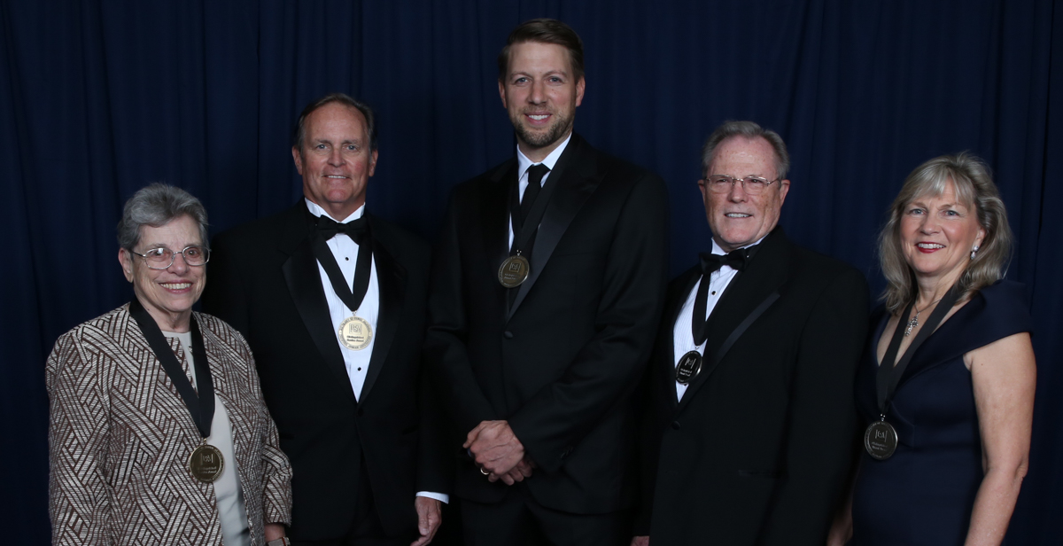 The University of South Alabama National Alumni Association honored four alumni and a Mobile businessman for outstanding accomplishments. There are, from left, Sr. Marilyn Joyce Aiello, O.P., M.D.; Ralph A. Hargrove; Caleb Crosby, ’03; Dr. Edward A. Panacek, COM ’81; and Tanya Fratto Blair, ’83.