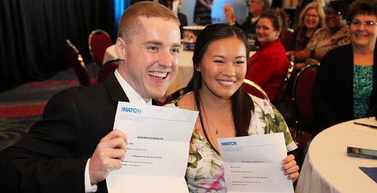 Seventy-seven senior medical students from the University of South Alabama College of Medicine gathered Friday in the Grand Ballroom at the Mobile Convention Center to open their letters from the National Resident Matching Program and find out where they will be continuing their medical education. 