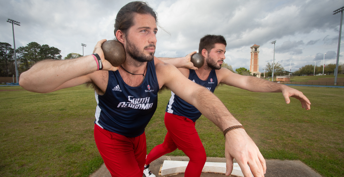 Twin brothers Ethan Boyd, left, and Thomas Boyd are first-year medical students at the University of South Alabama College of Medicine and athletes on the USA men's track and field team. “With us being so close and doing everything the same, part of that is competing against each other,” Thomas says. 