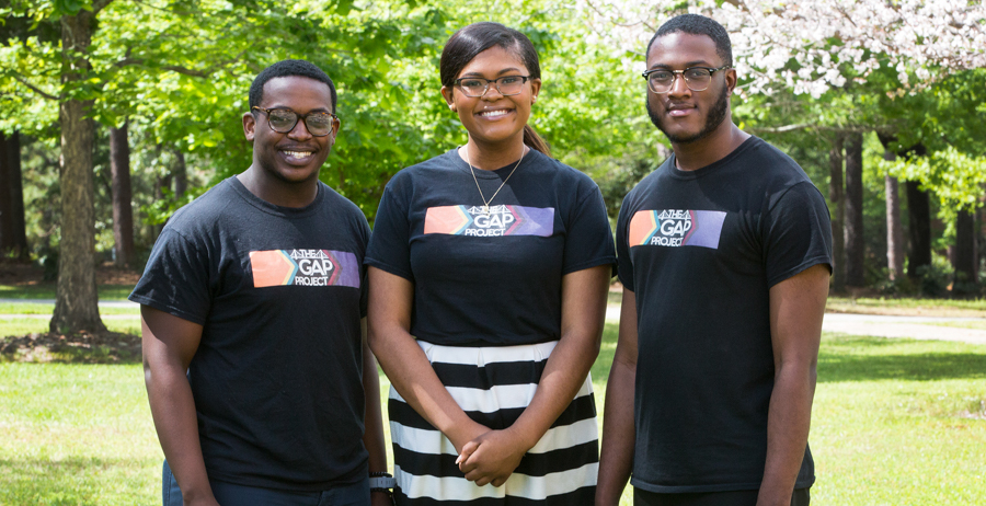The Gap Project, a mentoring program, is building better opportunities for middle and high school students through vision board socials, educational and fun activities. South graduate students and Gap Project board members from left are Javon Averett, vice president; Chelsia Douglas, secretary and Randy Bumpers, president. Board members not included in the photo are Faith Kilpatrick, communications director; and Ashley Chapman, accounts manager. data-lightbox='featured'