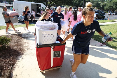 Student organizations and teams participated in Move-In Day to help welcome new students and move them into campus housing. 