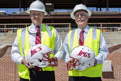 Jeb Shell ’00, Hargrove Engineers + Constructors chief financial officer, left, and Dennis Watson, Hargrove project director, helped announce a $1.5 million gift from Hargrove to Hancock Whitney Stadium. 