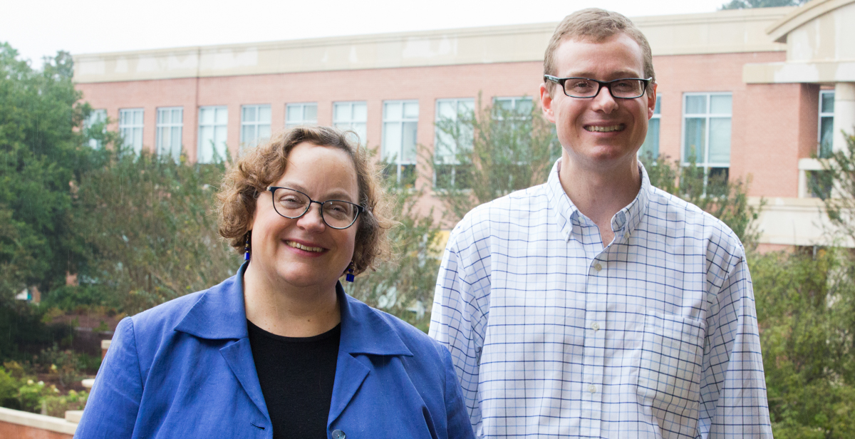 Dr. Laura Moore, left, associate professor and chair of music, and Dr. Silas Leavesley, professor of chemical and biomolecular engineering, were named respectively as Phi Kappa Phi’s artist and scholar of the year.