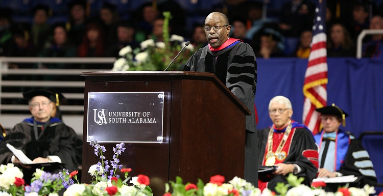 Dr. Alvin Williams, distinguished professor and chair of marketing and quantitative methods in the Mitchell College of Business, cautioned graduates against “success myopia” that can lead to disappointment and unwanted stress. “Craft a broader, more expansive definition of success in life,” he said. 