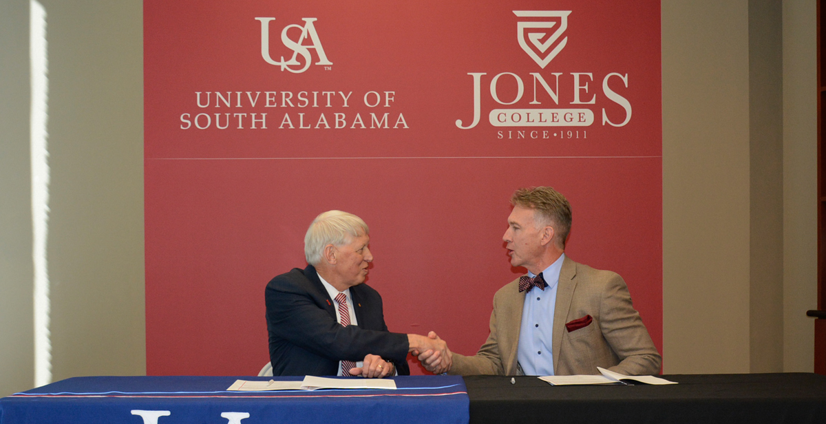 Dr. Tony Waldrop, left, president of the University of South Alabama, and Dr. Jesse Smith, president of Jones College, signed an agreement Friday that will expand access to a four-year degree through the Pathway USA program. 