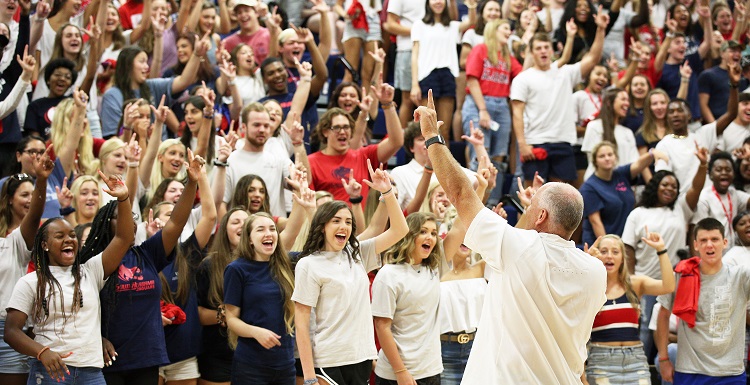 South Alabama football Coach Steve Campbell leads freshmen in a cheer during the 2019 Week of Welcome for new students. 