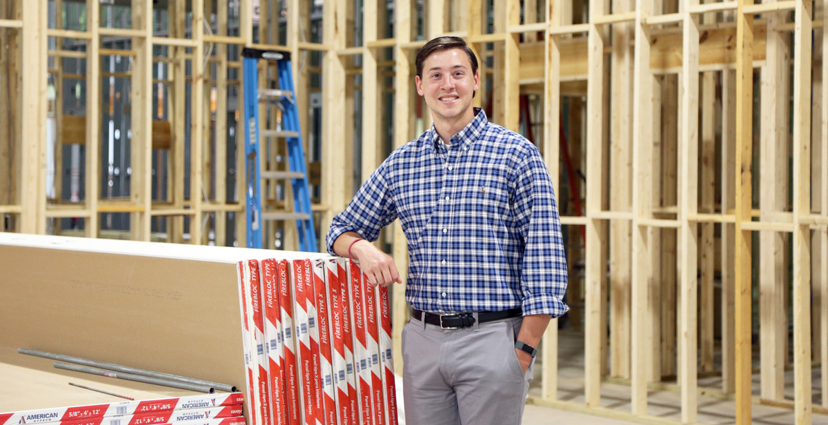Caleb Santa Cruz, a communication studies graduate, works as a youth pastor at Summit Church, which is constructing a new church building in Foley. 