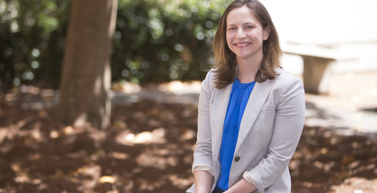 Dr. Claire Cage, associate professor of history and gender studies is one of 13 USA Office of Community Engagement and Service Learning Program Faculty Fellows. 