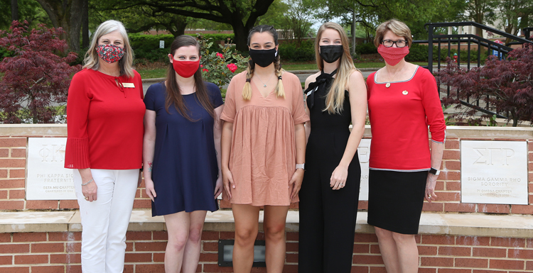 From left are Cathi Jones, assistant director of Fraternity and Sorority Life for USA, Alpha Chi Omega Sorority; 2020-2021 College Panhellenic President Payton Parnell,  Alpha Gamma Delta Sorority; 2019-2020 College Panhellenic President Kat Crochet, Alpha Omicron Pi Sorority; 2018-2019 College Panhellenic President Grace Galvin McArdle, Kappa Delta Sorority; NPC Area Advisor Betty Quick, Gamma Phi Beta Sorority;  Not pictured: USA Development Officer Aimee Meyers, College of Education and Professional Studies, Global USA,  Alpha Omicron Pi Sorority.  