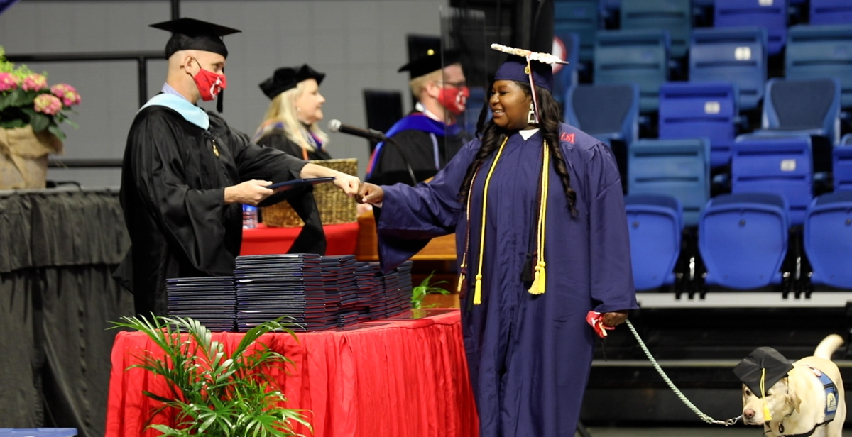 For two years, following a 2015 shooting, Kearria Freed was unable to walk unassisted. Last week, she walked across the stage at the University of South Alabama Mitchell Center – one of 2,119 spring and summer degree candidates. 