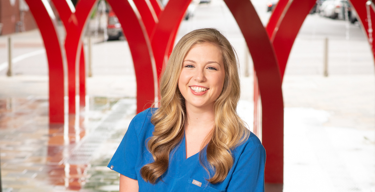 Mollie Wade, outside Children's of Alabama where she got a job as a nurse, is starting her career on the night shift. “I think I’ve always been a night owl,” she says. “It’s kind of my place.”