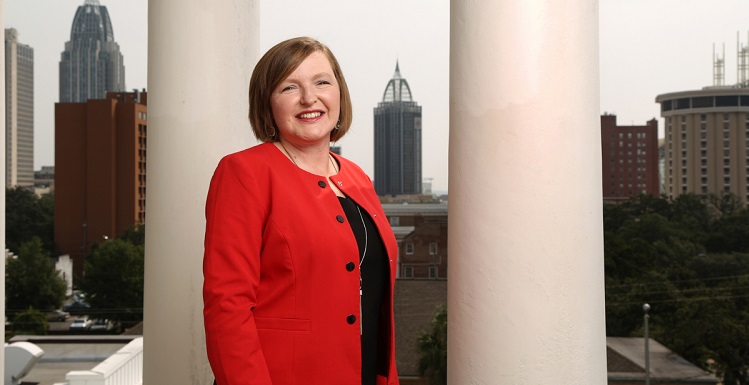 Principal Dr. Amanda Jones, a University of South Alabama alumna, stands under the rotunda at the Barton Academy for Advanced World Studies, Mobile County's newest magnet school. The school serving 6th-9th graders opened this fall in the renovated Greek Revival building that housed Alabama's first public school. data-lightbox='featured'