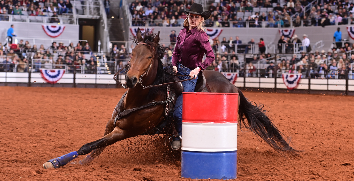 Wenda Johnson, who earned master's and doctorate degrees in nursing from the University of South Alabama, competes in the Fort Worth Stock Show and Rodeo earlier this year. Photo by James Phifer courtesy of the Women's Professional Rodeo Association.