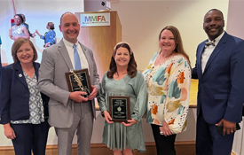 William Edmonds, second from left, who teaches French at Barton Academy has been named Alabama's Secondary Teacher of the Year and Alternate Teacher of the Year. Also pictured, from left; Dr. Amanda Jones, Barton Academy principal; Kelly Parker, Tanner Williams Elementary teacher and Top 16 finalist for Teacher of the Year; Nici Lowell, Tanner Williams Elementary principal; Chresal Threadgill, Mobile County Public School Superintendent.