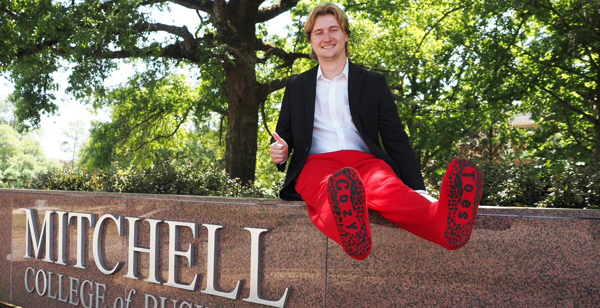 Quin Frazier, a finance senior in the Mitchell College of Business, said cold feet inspired the idea for Cozy Toes. When he’s not in class or managing his new business, he’s trading stocks and looking for his hot next venture.