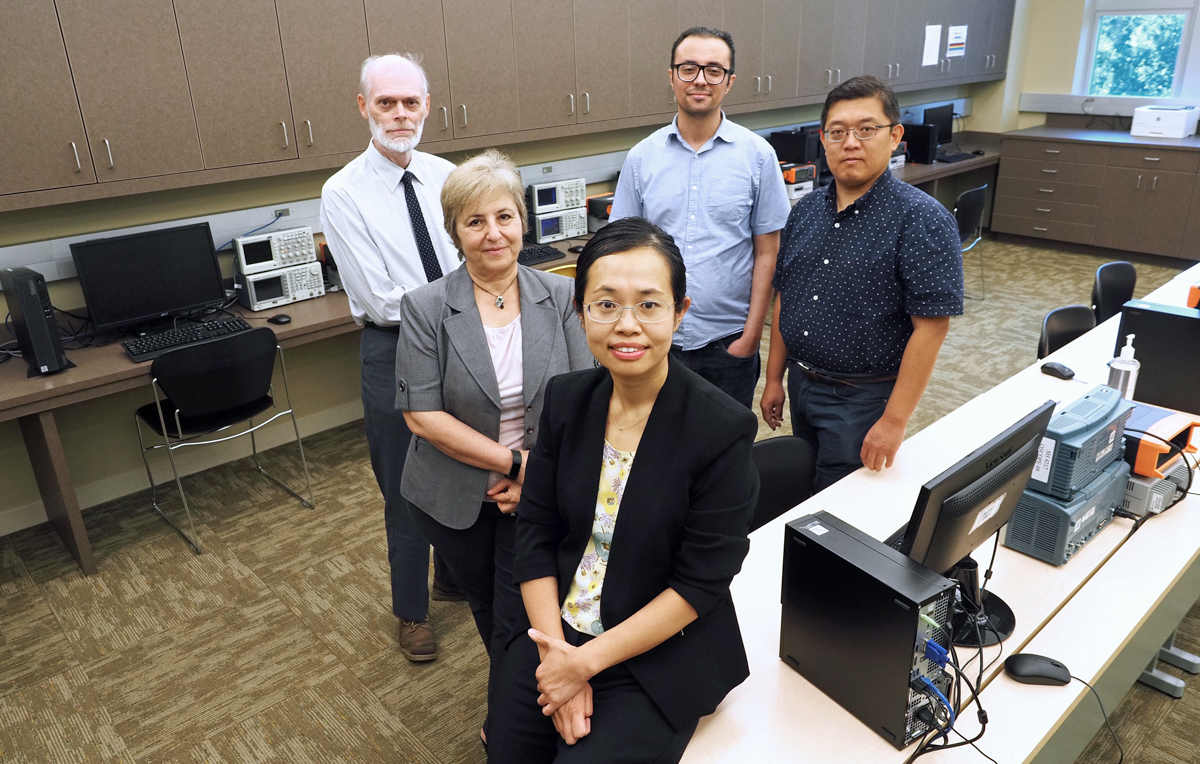 Dr. Na Gong, front, is leading an artificial intelligence research team in a $6 million National Science Foundation project. Her South colleagues in the program include, left to right, Dr. Clive Woods, Dr. Hulya Kirkici, Dr. Mohamed Shaban and Dr. Jinhui Wang.