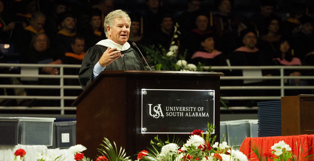 Julian MacQueen, a University of South Alabama alumnus and chairman and founder of Pensacola-based Innisfree Hotels, told graduates to look at the world as full of abundance. data-lightbox='featured'