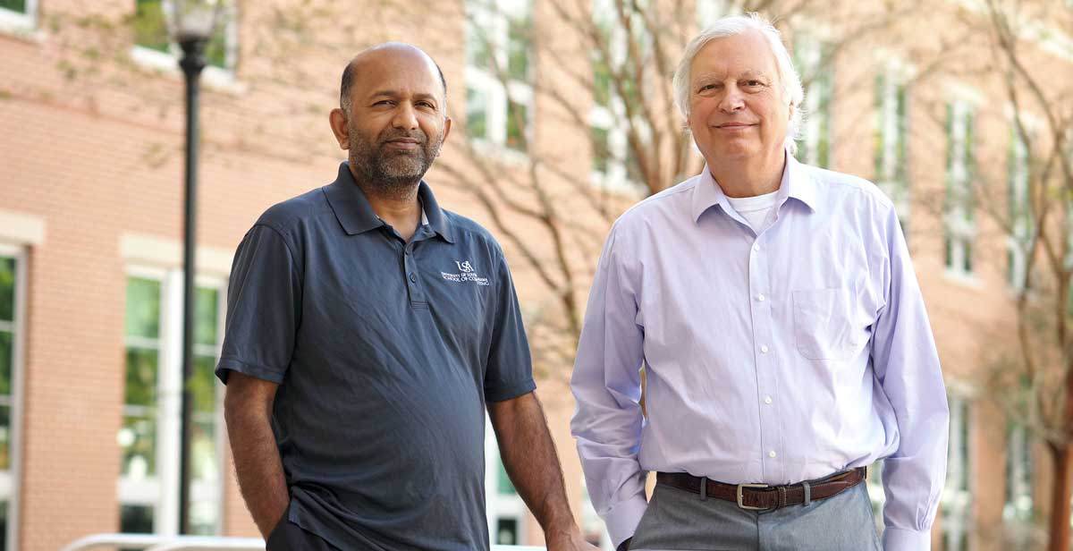 Dr. Prakash Duraisamy, left, assistant professor of computer science, and Dr. James Van Haneghan, chair of the Department of Counseling and Instructional Sciences, are collaborating on research that will examine the relationship between social media use and COVID-19 vaccine hesitancy among African American communities in Alabama. data-lightbox='featured'