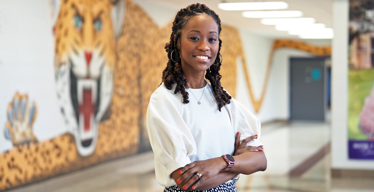 Darlene Lewis, who earned a bachelor's degree and then a master's in school counseling from the University of South Alabama, works with students at Blount High School in Prichard, her hometown.