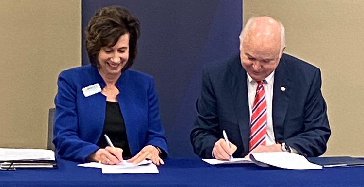 Dr. Mary S. Graham and Jo Bonner sign Pathway USA extension