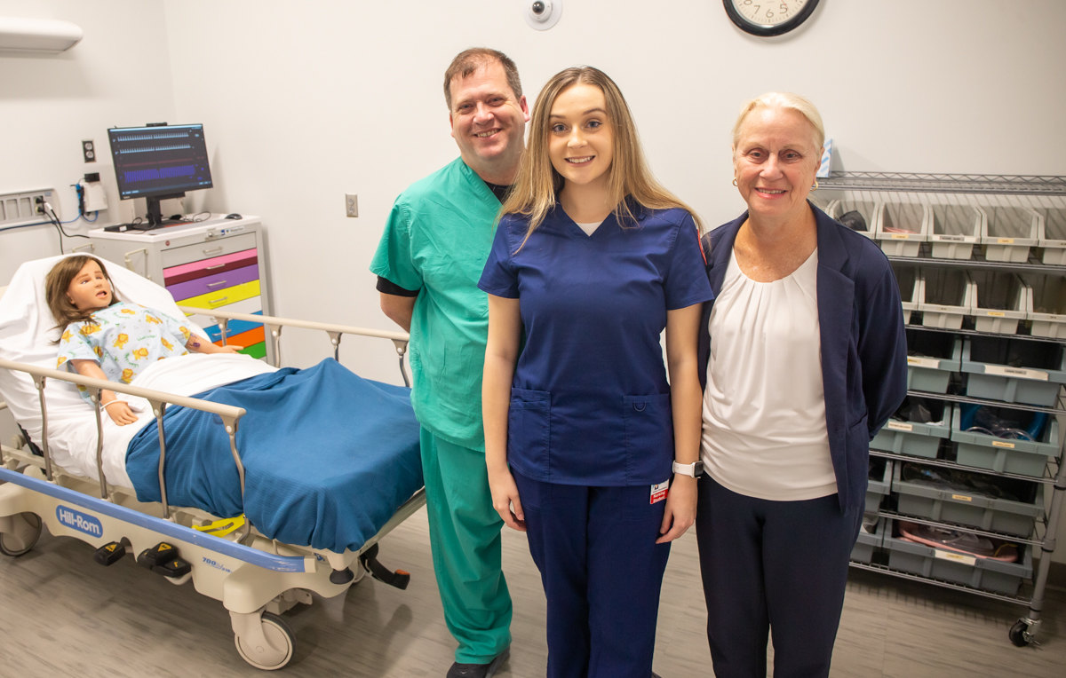 University of South Alabama nursing student Alli Boudreaux joined her father, Mike Boudreaux, and grandmother, Anita Sirmon, both South nursing alumni, on a recent tour of the Health Simulation Building. 