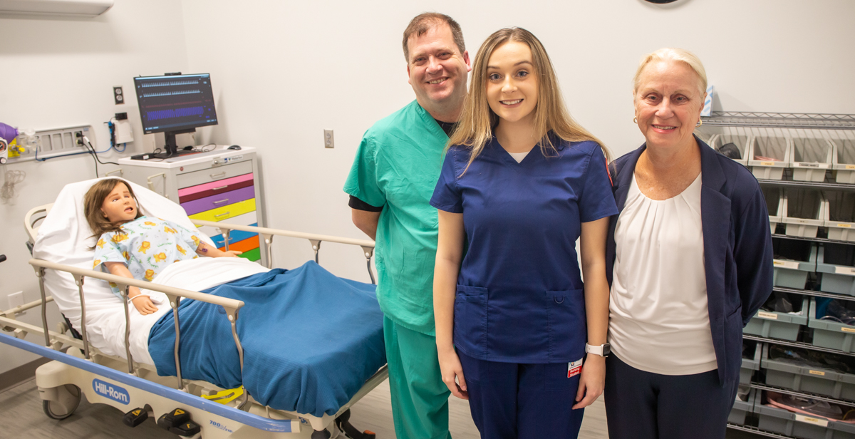 University of South Alabama nursing student Alli Boudreaux joined her father, Mike Boudreaux, and grandmother, Anita Sirmon, both South nursing alumni, on a recent tour of the Health Simulation Building. 