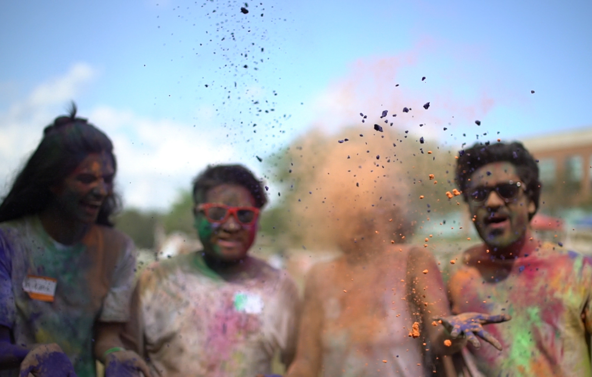 Students celebrating Holi, the Hindu festival of colors.