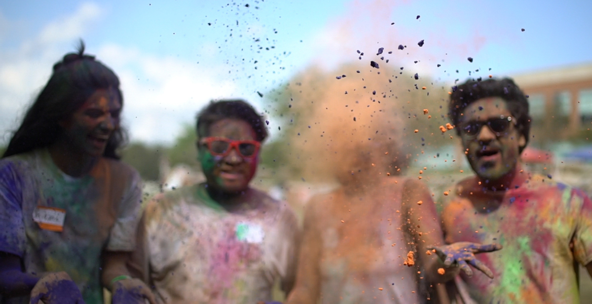 Students celebrating Holi, the Hindu festival of colors.