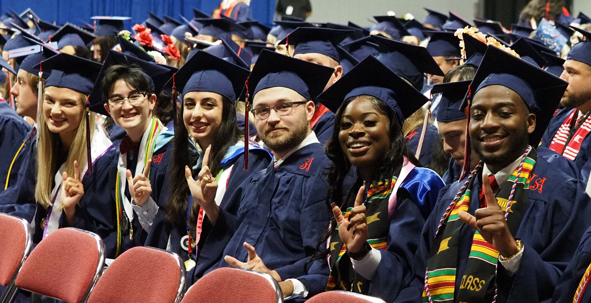 Nearly 2,100 spring and summer graduates were celebrated during Commencement ceremonies Friday and Saturday at the USA Mitchell Center. 