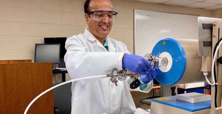 University of South Alabama physics professor Dr. Arjun Dahal researching clean energy.