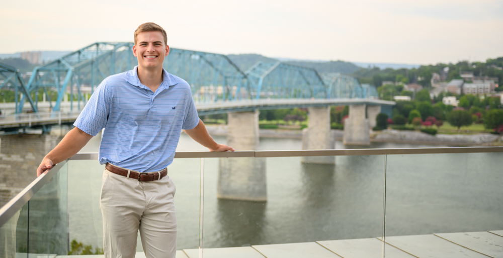 Matt Simm chose to work remotely in Chattanooga, Tennessee, because of the relatively low cost of living and the natural beauty of the mountains and the Tennessee River, shown here from the Walnut Street Pedestrian Bridge. data-lightbox='featured'