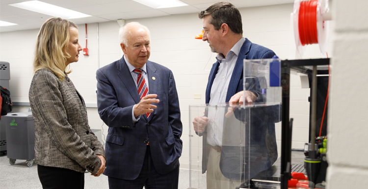 USA president Jo Bonner, executive vice president Dr. Andi Kent and Dr. Matt Reichert discuss the merits of South's new 3D lab.