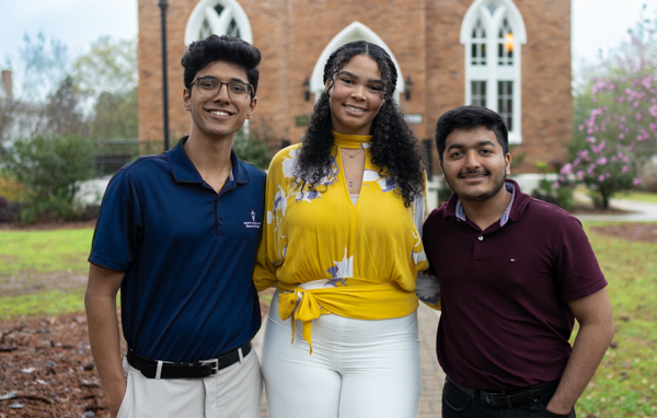 Three University of South Alabama Honor College students, from left, Suhas Patil, Kaitlyn Riggins and Dev Mehta, recently took third, second and first place in a competition for research posters at the Alabama Academy of Science Conference.