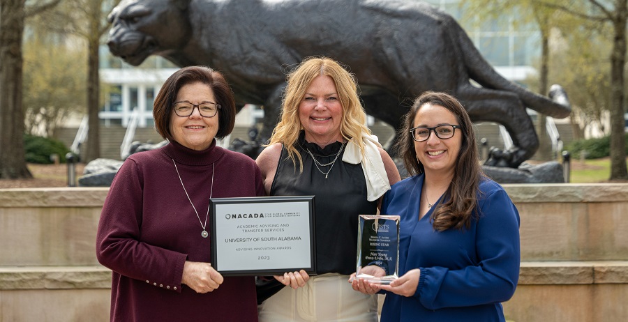 The Academic Advising and Transfer Services office at the University of South Alabama, led by Associate Director Patricia Davis, left, and Executive Director Catherine Preston, center, recently received the 2024 Advising Innovation Award from the National Academic Advising Association. Nani Perez-Uribe, right, transfer coordinator, was named as one of four Rising Stars by the National Institute for the Study of Transfer Students. 