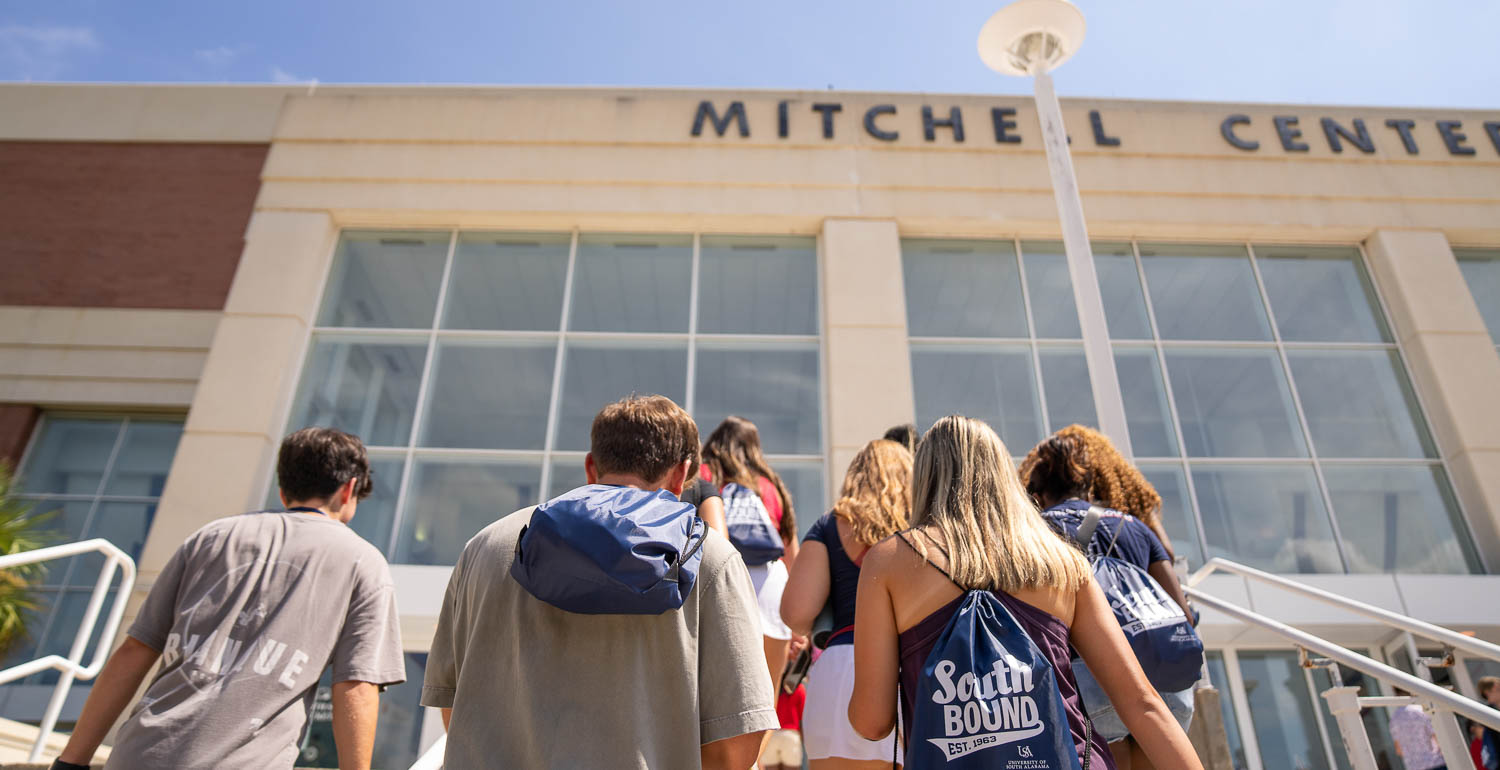 Students on the steps of the Mitchell Center
