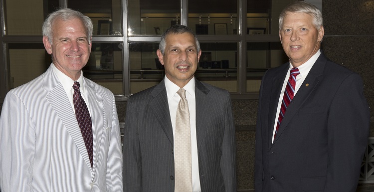 Singapore's Ambassador to the United States, Ashok Mirpuri, center, met with Congressman Bradley Byrne, left, and University of South Alabama President Dr. Tony Waldrop during the ambassador's visit to the USA campus. 