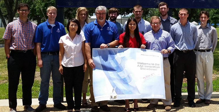 USA students finished first and second in the recent Airbus Innovation Showdown. Pictured outside the Airbus Engineering Center in Mobile are, from left, Dr. Carlos Montalvo, assistant professor of mechanical engineering; Andrew Gumpert, Airbus Innovation engineering intern; Keping Lu, a management major from Beijing, China; Marina Swanepoel, a mechanical engineering major from Wellington, South Africa; Joachim Hehemann, Airbus director of integration; Steven Shettlesworth, a mechanical engineering major from Mobile; Brandi DePineuil, a mechanical engineering major from Ocean Springs, Miss.; Micah Calhoun, an economics and finance major from Mobile; Jonathan Hansert, an accounting major from Semmes; Dan Smithson, an electrical engineering major from Wetumpka, Ala.; Andrew Tindell, a mechanical engineering major from Pensacola, Fla.; and Adam Brown, a graduate student in computer science from Mobile.