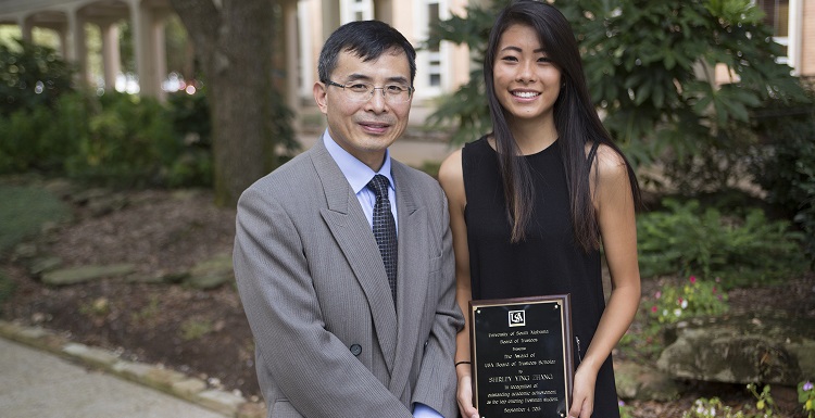 USA Board of Trustees Scholar for 2015-2016, Shirley Zhang of Vestavia Hills, Ala., is pictured with her father, Rusheng Zhang, after receiving her scholarship from the USA Board of Trustees. 