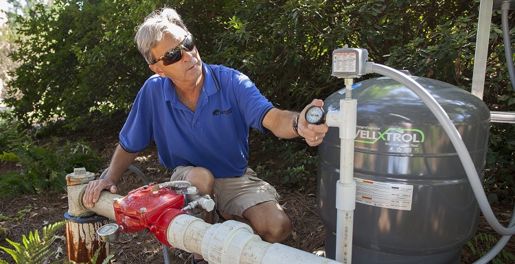 Landscaping Manager Gary Carley checks the campus wells daily.  Carley and his employees use the wells for irrigation purposes, such as watering grass and flowers, but the well water is also used in the generation of the chilled water used to cool the campus buildings.   