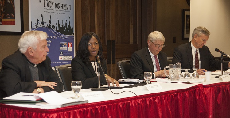 USA President Dr. Tony G. Waldrop joins education leaders during a panel discussion at the 2015 USA Education Summit and Founders Day held at the USA Mitchell Center. Waldrop discussed student academic success and support efforts. From left, the Rev. Gregory Lucey, president of Spring Hill College; Dean of Instructional Services Dr. Latitia McCane, Bishop State Community College; Waldrop; and Chancellor Dr. Mark Heinrich, Alabama Community College System. 