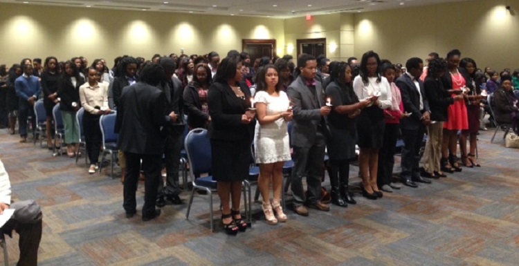 members from Abeneefoo Kuo Honor Society assembled in meeting room