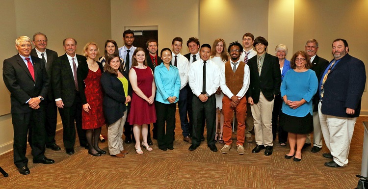 The 2015 USA Academic All Stars receive recognition for research and fellowship opportunities. From front row left are, President Tony G. Waldrop; Dr. Andezej Wierzbiciki, dean of the College of Arts and Sciences; Dr. David Johnson, provost and senior vice president for academic affairs; Brandi Stewart; Bethany Cobb; Ningyong Xu; Minh Lu; George Moore; Nick Grondin; Dr. Marsha Hamilton, scholarship coordinator for the USA Honors Program; and Dr. Michael Doran, director of the USA Honors Program. From back row left are, Johanna Schleinitz; Kari Servold; Nikunj Patel; Bryan  Ricksecker; Jan Hellmich; Robert Mines; Hannah Becton; Ric Poirson; Dr. Sally Steadman, scholarship coordinator for the USA Honors Program; and Dr. John Steadman, dean of the USA College of Engineering. Not pictured are Catherine Zivanov, Mikayla Wheeler, Kadeem Fuller, Brandon Rittelmeyer and Greg Lewis.